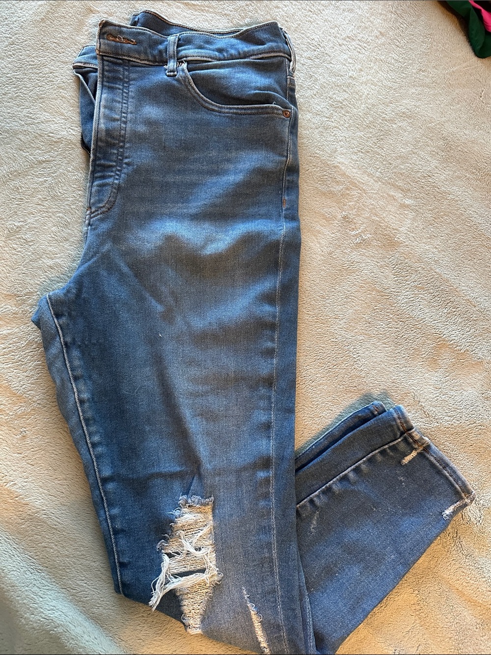 Express Women's Cropped Skinny Jeans in Faded Blue with Distressed Knee
